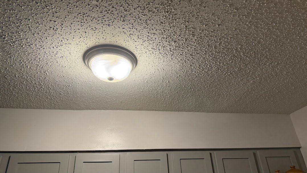 Popcorn texture ceiling after repair, texture matched