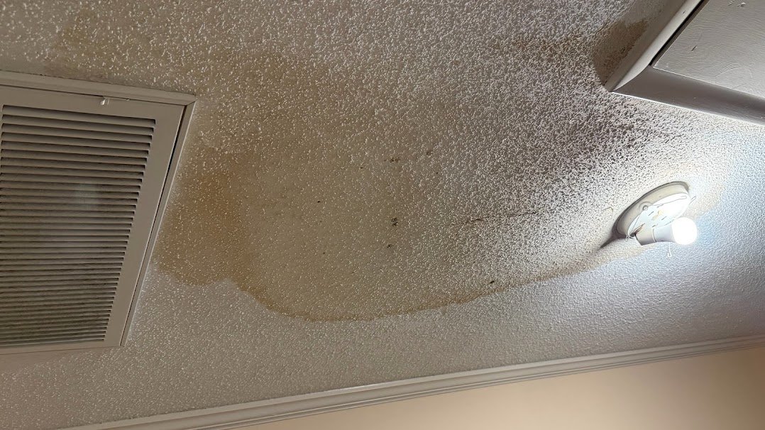 Water damaged ceiling before repair